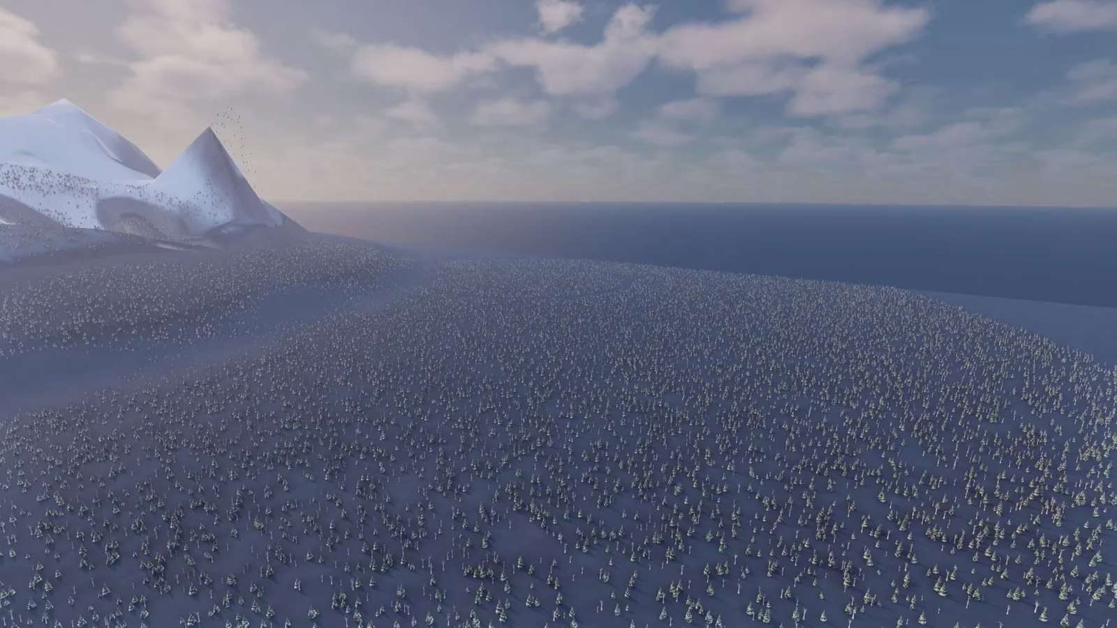 A wide snowy pine forest sloping down to a dark sea, with a white peak at the left edge under a cloudy sky.