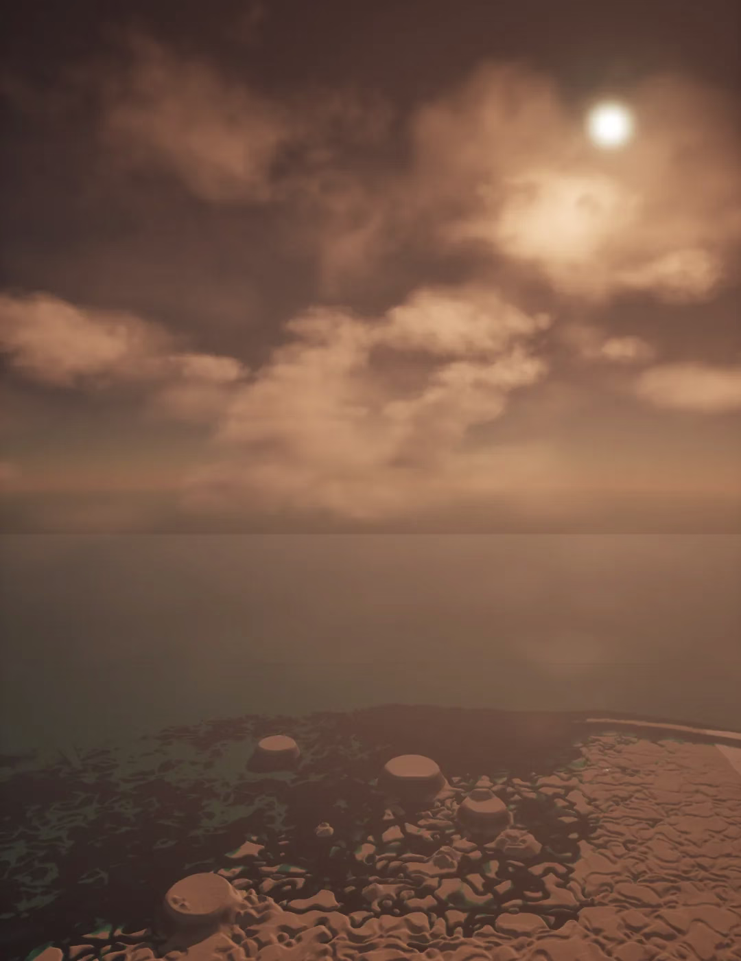 A tall frame of a hazy sunset: a dim flat sea under heavy brown clouds with a bright white sun, and a rim of rippled sand with a few round stone pedestals along the bottom.