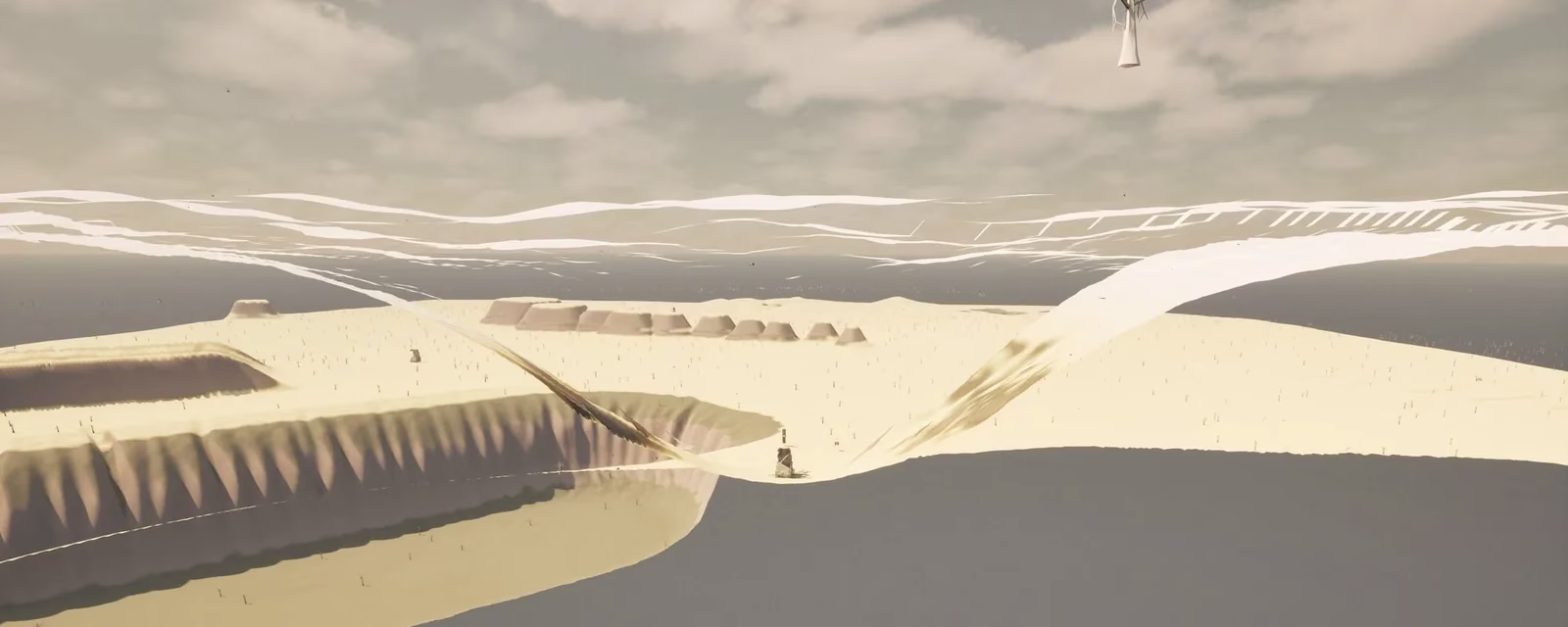 A pale sandy plateau with a long ribbed cliff above a flat grey expanse, ribbons of sand stretched up into the sky, and a pale tree hanging upside down at the top of the frame.