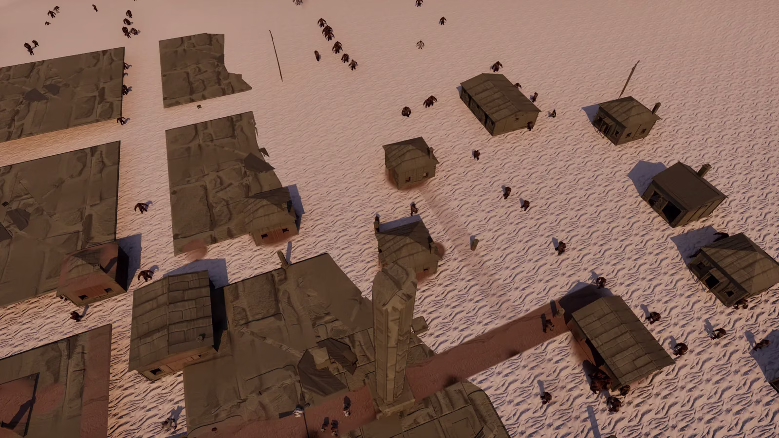 An aerial view of a pale town with tan buildings, tiny figures and a long dirt path under pink-tinted light.