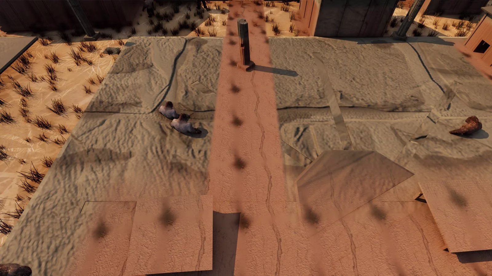 A top-down view of a dirt street between wide flat paving slabs, one tipped up at an angle, with two small figures crouched on the slabs and dry grass at the edges.