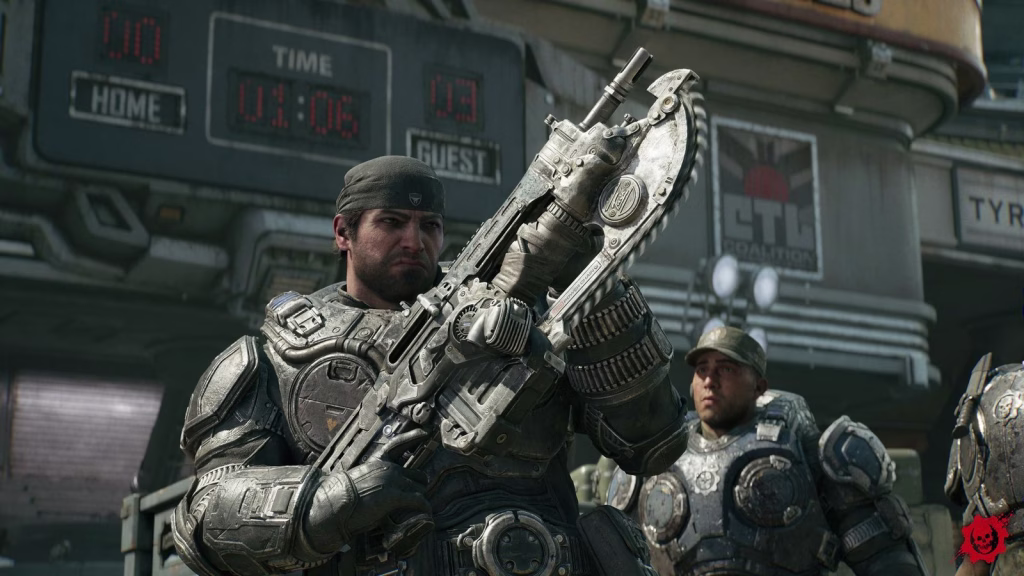 Marcus Fenix holds up a Lancer rifle with its chainsaw bayonet in front of a stadium scoreboard, another COG soldier behind him.